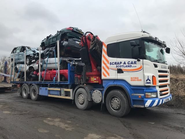Loaded Scania transporter carrying end-of-life vehicles collected near Hamilton